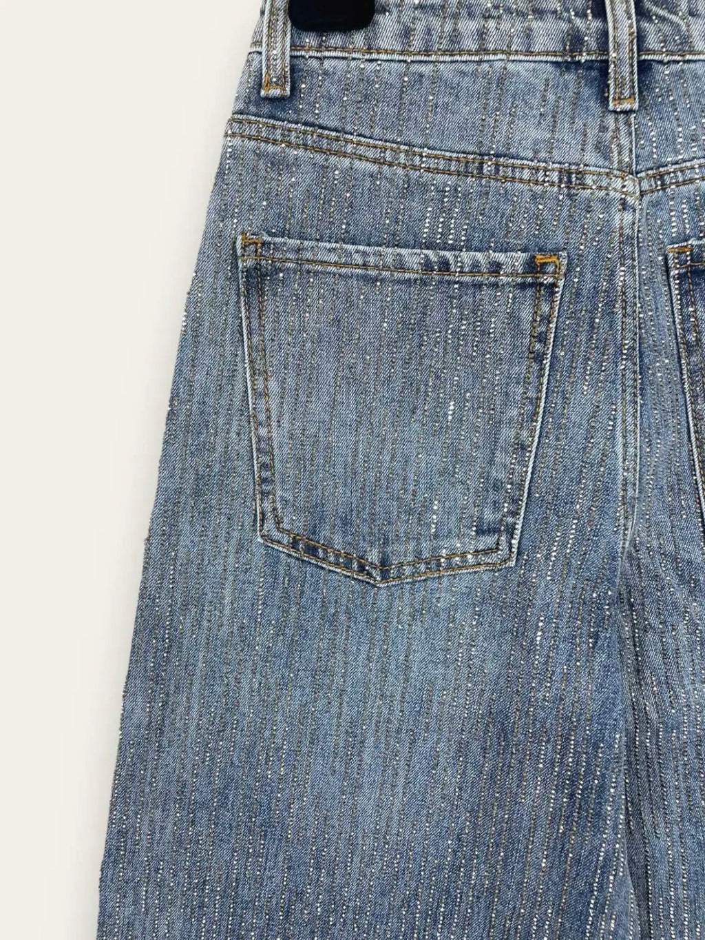 Jeans cascata brillantini